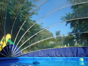 TROPIKO pool roofing for the extended swimming season, a warm pool and azure clean water. For above ground and inground (circular / round) garden pools. Pool cover.