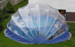 TROPIKO pool roofing for the extended swimming season, a warm pool and azure clean water. For above ground and inground (circular / round) garden pools. Pool cover.